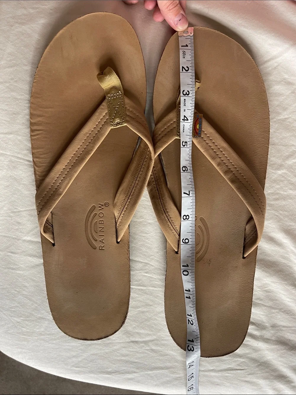 Rainbow Men's Tan Leather Flip Flops with Gold Accent